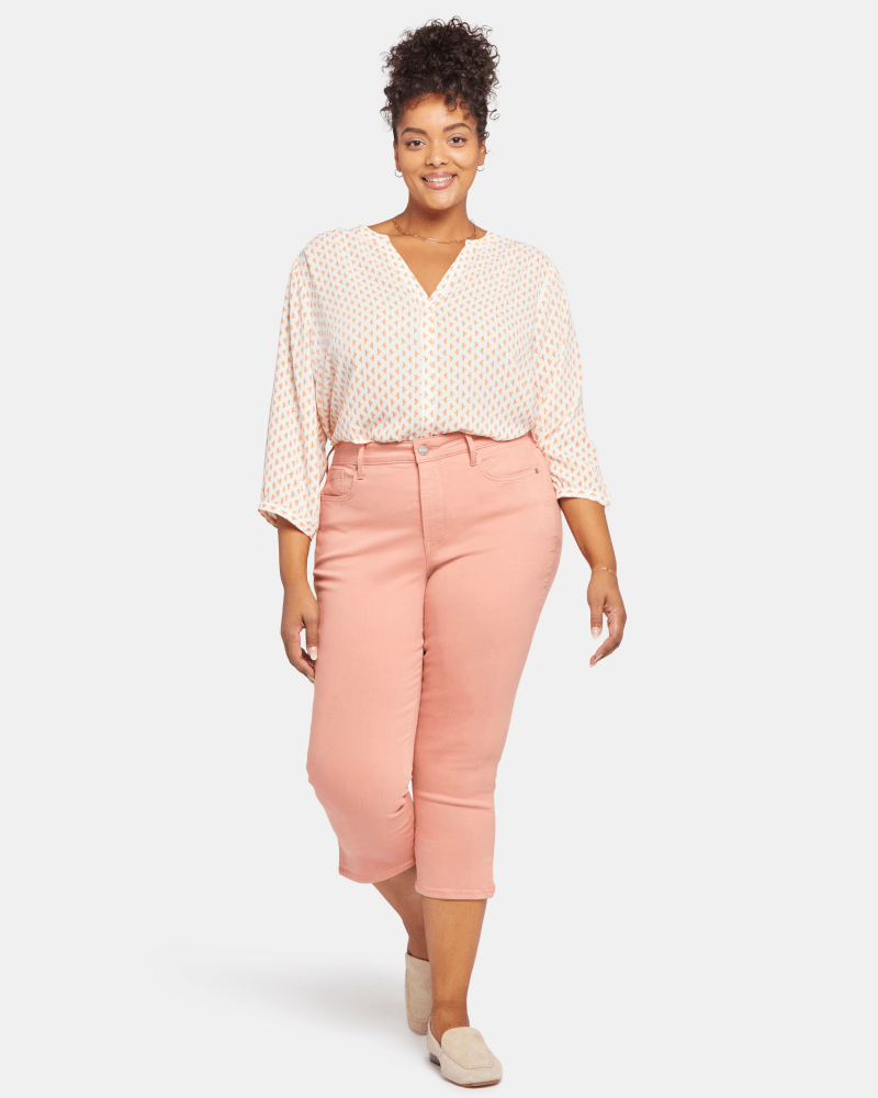 Front of a model wearing a size 14W Chloe Capri Pant in Terra Cotta by NYDJ. | dia_product_style_image_id:200345